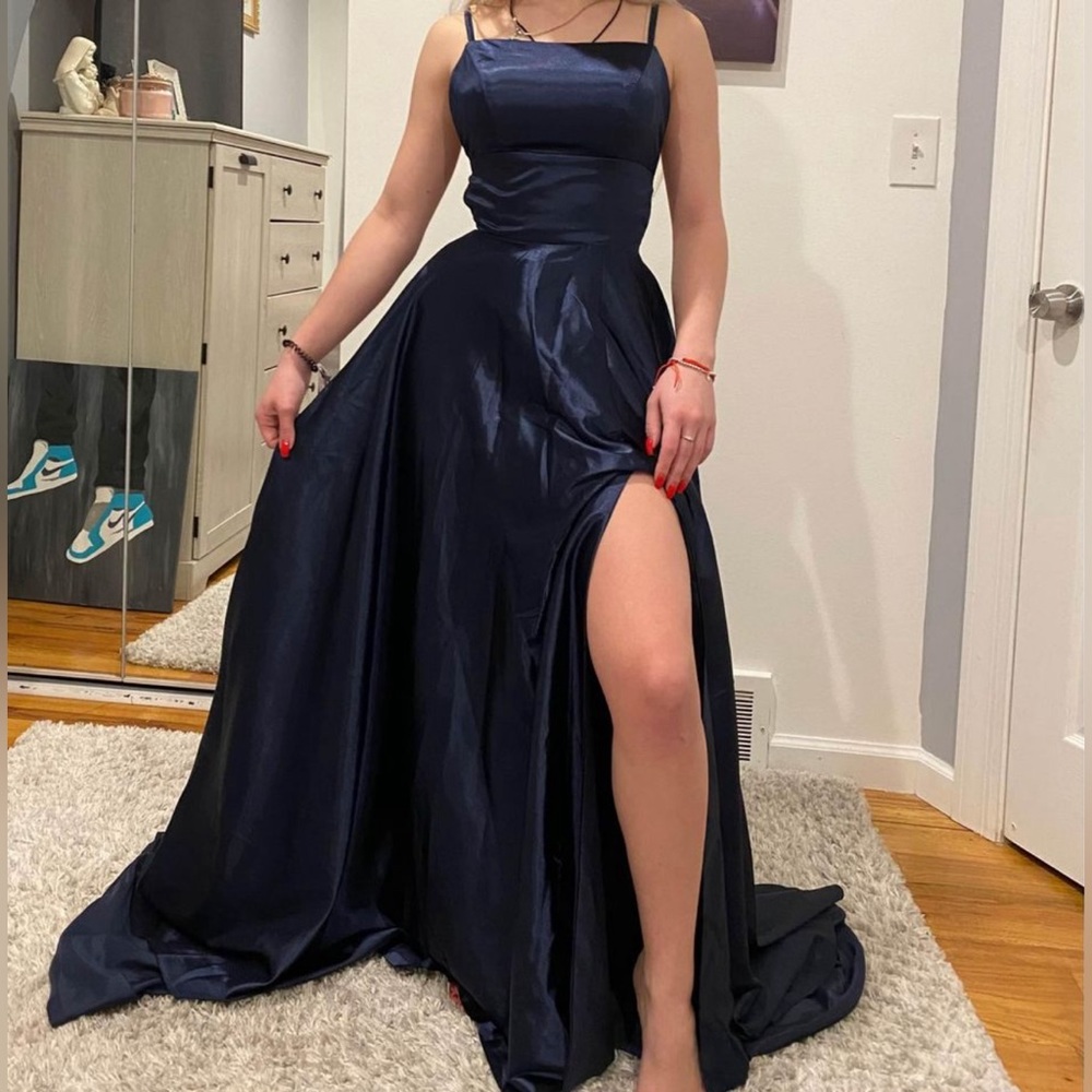 blue prom dress, a maxi dress, that has never been worn and I no longer need it.